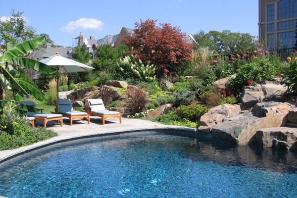 Stone patio pool: elevated stone patio ideas pictures remodel and ... Patio Pool Ideas